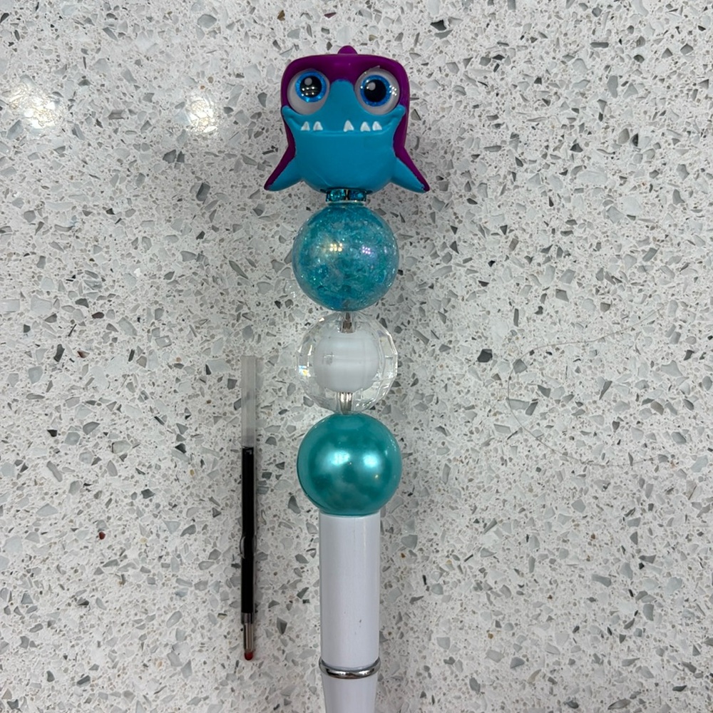 Neon Bruce Doorables Pen with ink refill